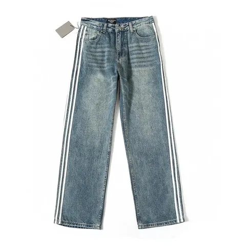 Balenciaga blue denim jeans with side stripes