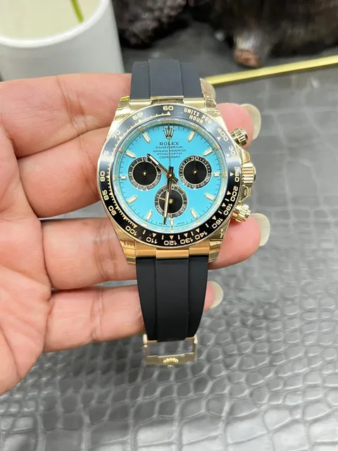 Rolex Cosmograph Daytona Watch with Light Blue Dial and Black Rubber Strap
