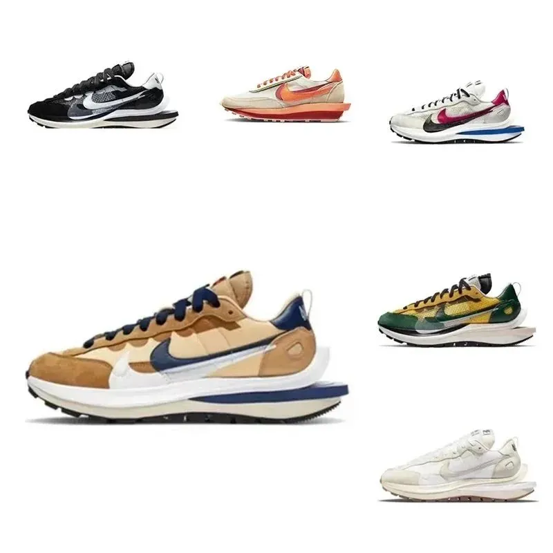 Nike niski profil sneakers z wielokolorową, warstwową cholewką i dużym Swooshem na białym tle.
