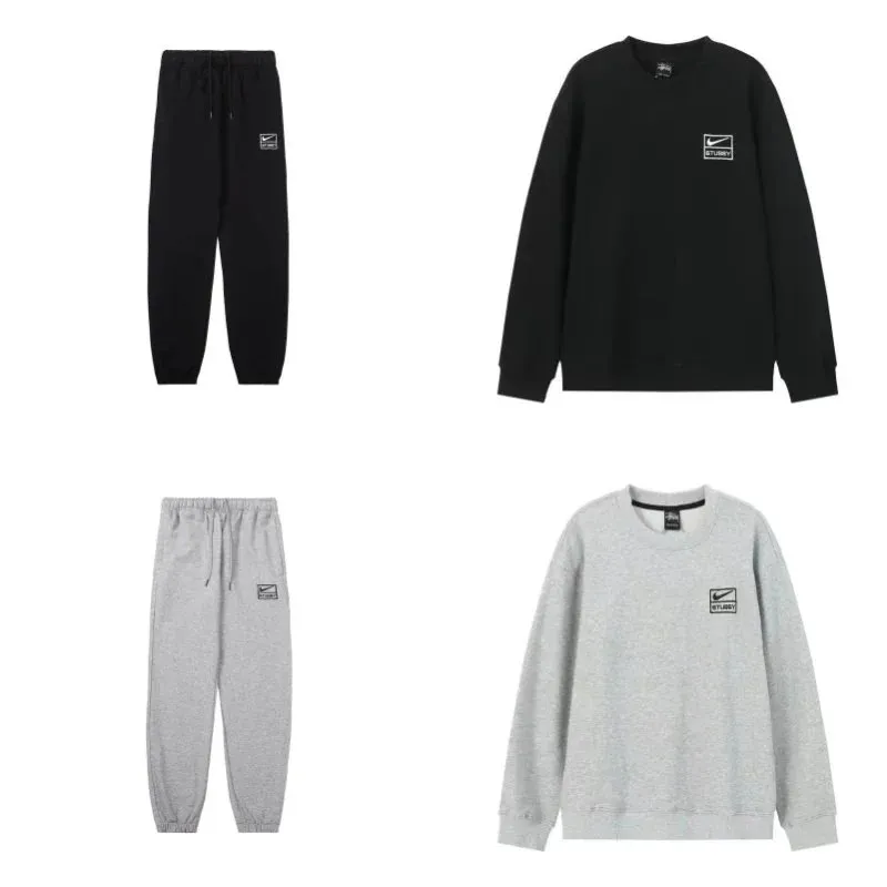 Nike set dresowy z bluzą crewneck i joggerami w czerni i szarości