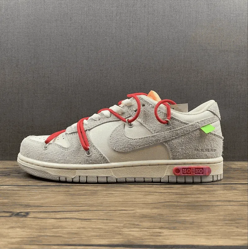 Nike niski profil sneakers z czerwonym sznurowaniem i bocznym logo na boku