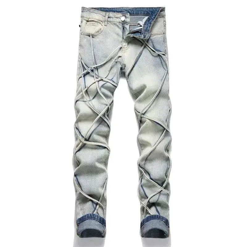 Unbranded jeans w jasnoniebieskim spraniu z krzyżującym lacingiem na nogawkach.