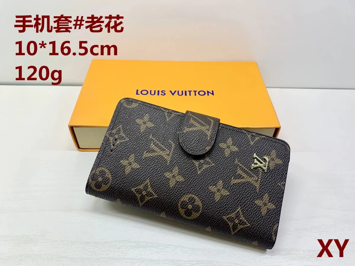 Louis Vuitton wallet with a fold-over flap, monogram pattern, and gold-toned logo detail.