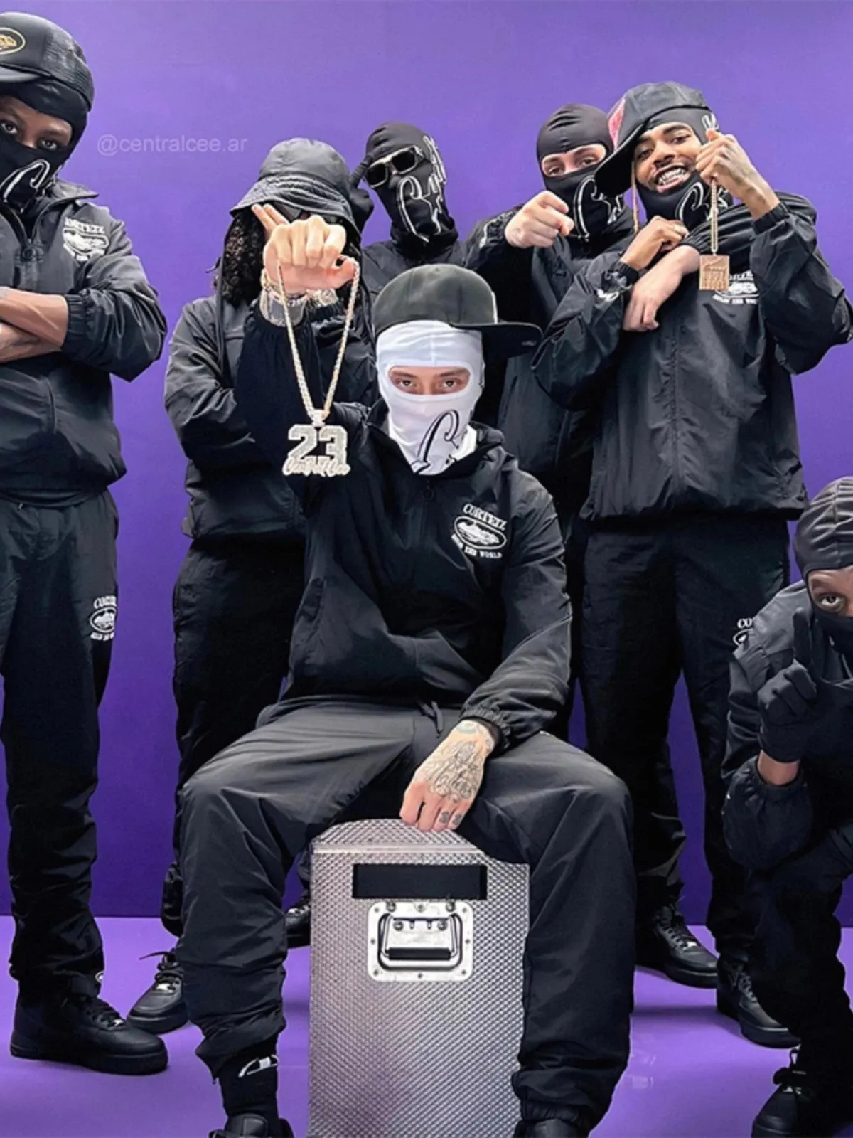 Corteiz black windbreaker-style matching set with hood, chest patch, and loose pants.