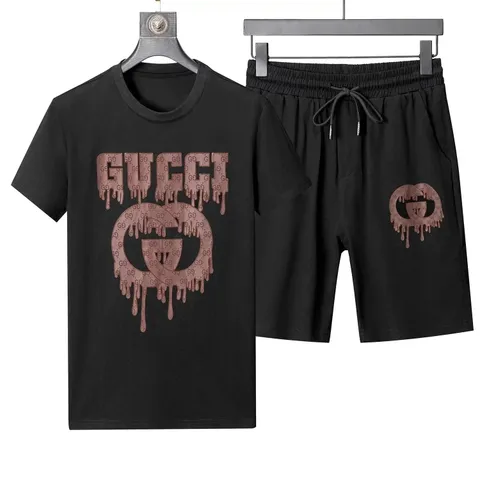 Gucci Black T-shirt and Shorts Matching Set with Dripping Logo Print