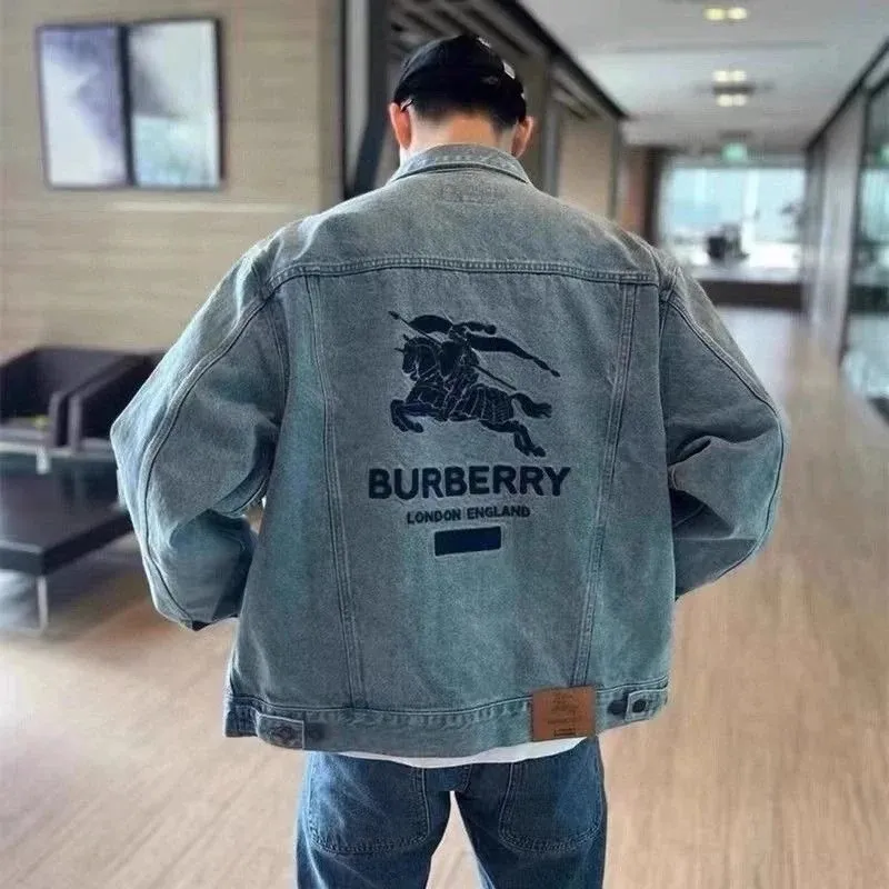 Burberry denim jacket in washed blue with a large BURBERRY back graphic and boxy fit