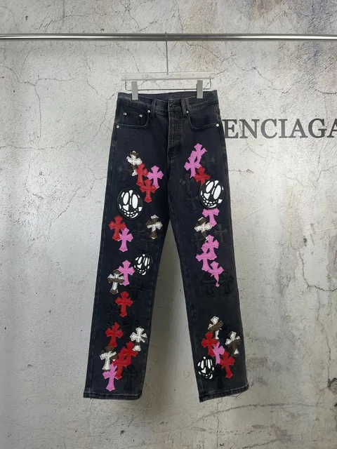 Chrome Hearts Black denim jeans with multi-colored cross and skull patches