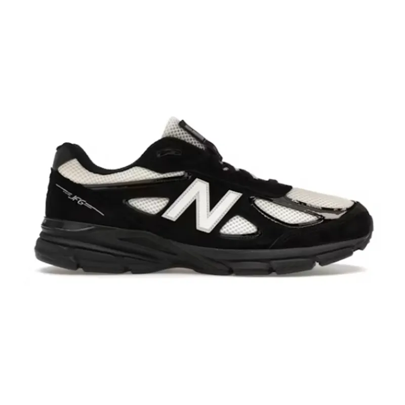 New Balance sneaker w czerni, bieli i szarości z dużym bocznym logo na białym tle.