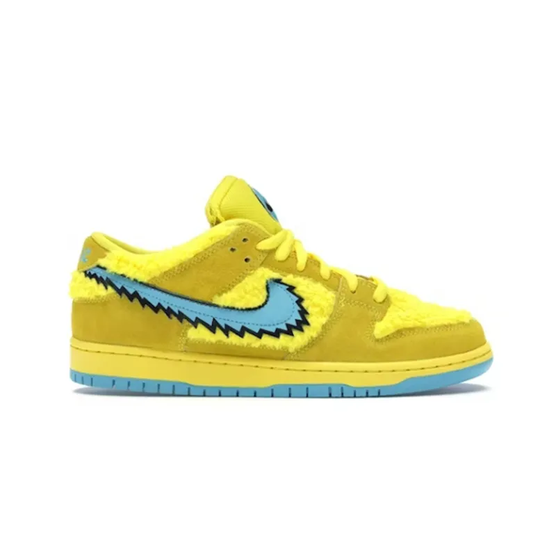 Nike sneakers w żółci z jasnoniebieskim Swooshem, widok z boku