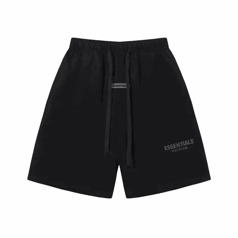 Black Essentials shorts laid flat with a drawstring waistband and leg print.