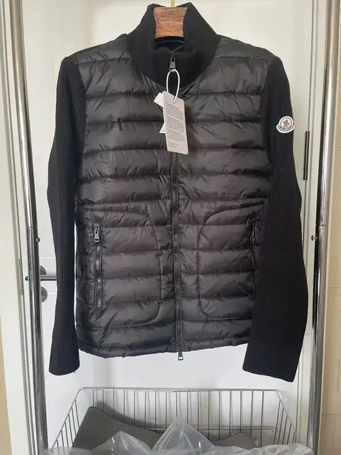 Moncler black quilted puffer jacket with knit sleeves