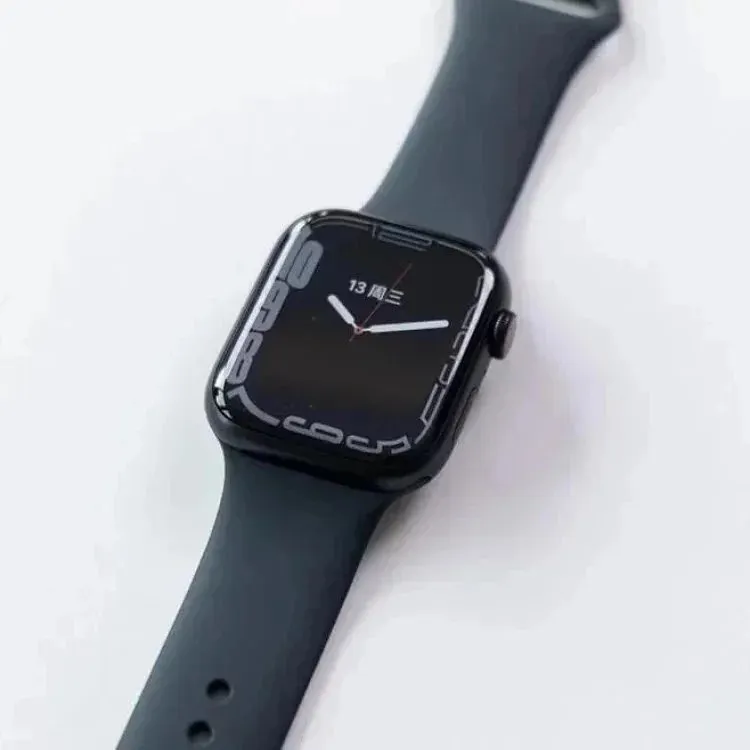 Apple-style black smartwatch with a black strap and analog-style face on white background.