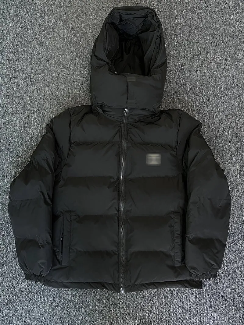 Unbranded black hooded puffer jacket with boxy fit and zip pockets.